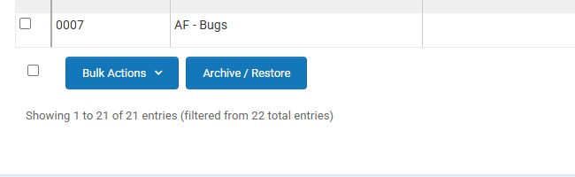 Audits table bulk-action controls showing the Archive / Restore button